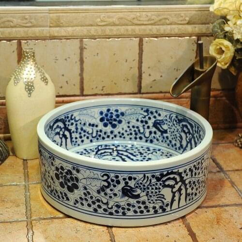 China Artistic Handmade Ceramic Bathroom Sinks Lavobo Round Counter top porcelain sink with countertop