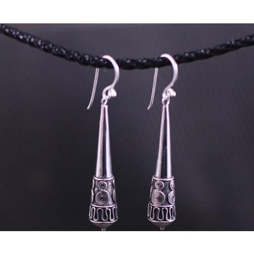 S925 Thai silver wholesale hand carve patterns or designs on woodwork eardrop female model