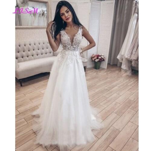 Charming A-Line Beach Wedding Dresses V-Neck Backless Lace Appliques Boho Bridal Gowns Sleeveless Wedding Bridal Dress