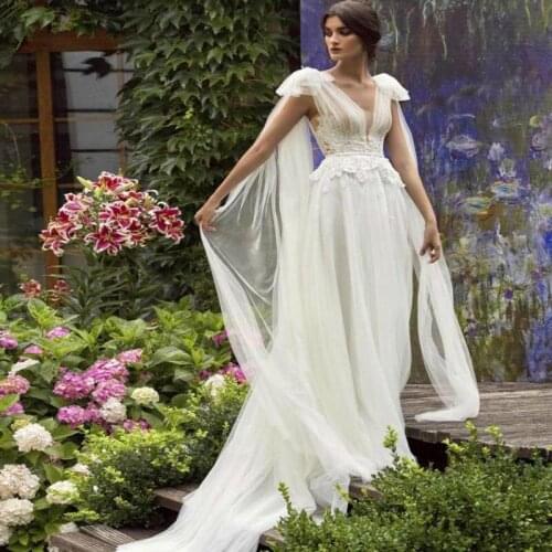 Fairytale Boho Wedding Dresses 2021 Caftan Dubai Lace Country Reception Dress Illusion V Neck Backless Bohemain Bridal Gowns