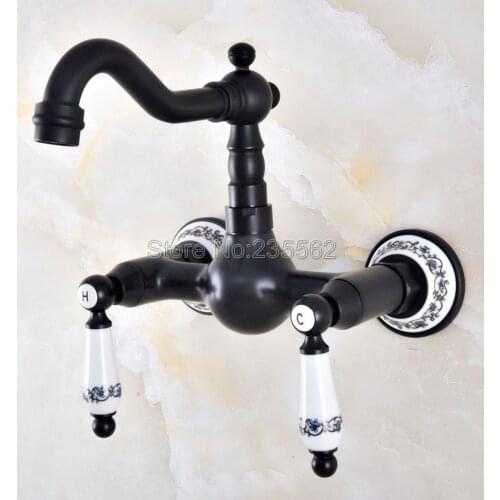 Black Oil Rubbed Bronze Wall Mounted Swivel Spout Bathroom Sink Faucet Double Handle Mixer Tap Wall Mounted Lnf864