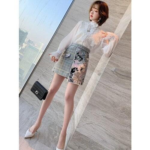 Different material stitching jacquard retro Plaid irregular high waist half skirt womens wear 2021 spring new