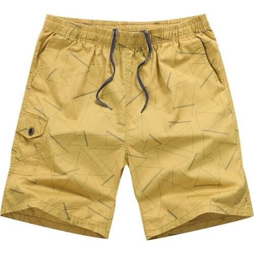 2020 mens summer beach five-point pants trend youth elastic loose sports straight mens shorts