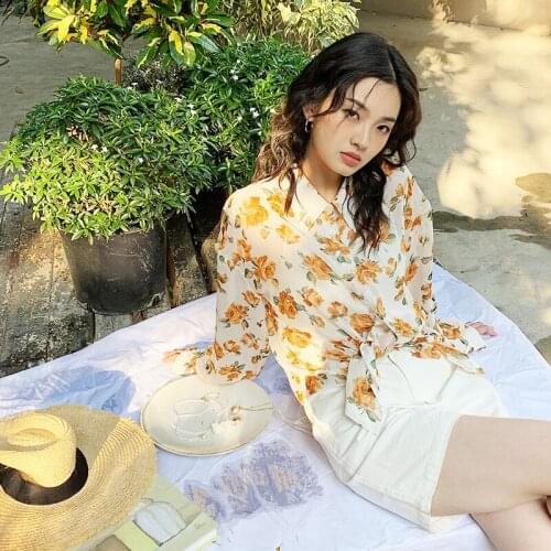 Spring single 2021 breasted long sleeve Lapel print temperament commuting Chiffon stitched cardigan breathable Korean womens