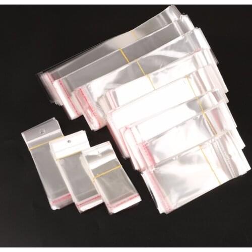 100Pcs/ Lot Clear Self Adhesive Seal Plastic Bag Pouch Party OPP Packing Storage Bags Hang Hole