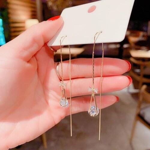 Korea Dongdaemun dynamic fashion water drop long ear line temperament simple tassel show face thin female earrings