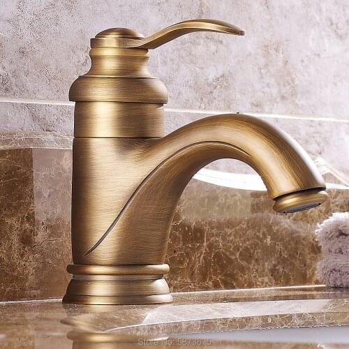 Bathroom faucet double handle basin container sink faucet brass hot and cold wash basin faucet antique brass installed on the de