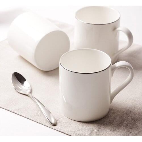 High Quality bone china ceramic brief with spoon handgrip white breakfast milk tea coffe mugs and cups luxury decorative cups