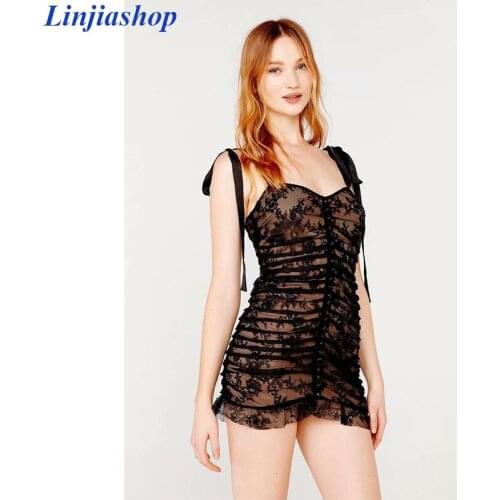 Dolly Mini Dress For Love Lemons features pleated lace satin straps ruffled scalloped hemline front buttons short black dress