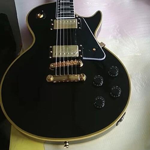 China OEM customized black guitar with yellow binding, ebony fretboard electric guitar
