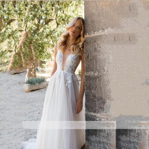 Sexy V-neck Wedding Dresses Boho Off the Shoulder Lace Applique Backless Floor Length A Line Tulle Bridal Gowns Vestido de Noiva