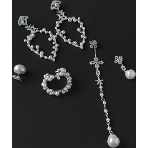 S925 sterling silver September new star and moon earrings pearl moon cross flower earrings ear bone clip popular in Korea