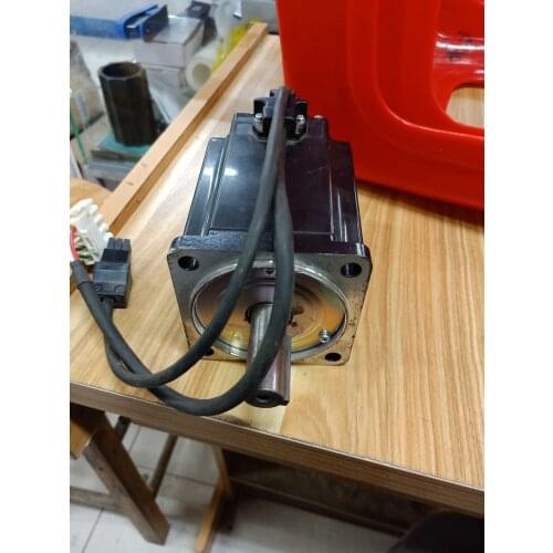 GYS751DC2-T2C servo motor , used in good condition . 80% appearance new , good working , free shipping
