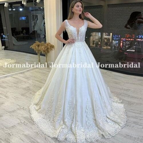 Princess A-Line Wedding Dresses Illusion Bodice Appliqued Deep V-Neck White Bridal Gowns With Tassel Backless Turkey Bride Dress