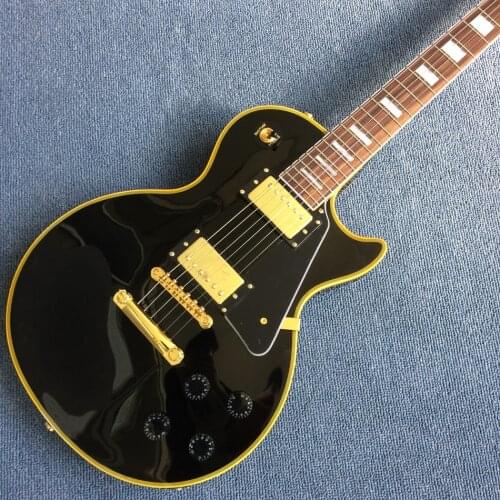 Free delivery, black electric guitar, Rosewood fingerboard, , yellow binding with gold hardware