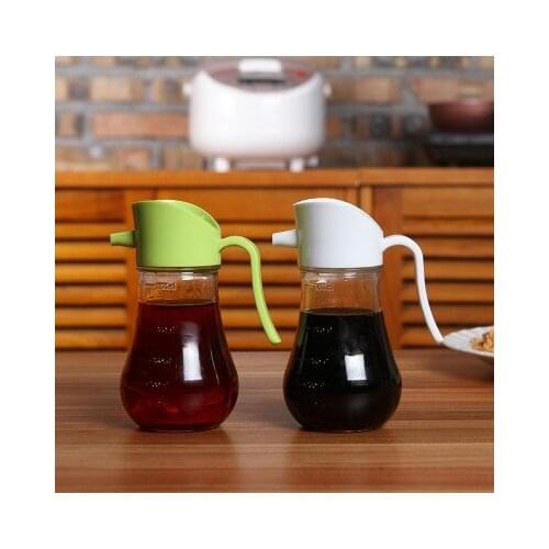 The kitchen used liquid condiment portable oil can receive glass can be control oil bottle 9.9*7.8*15cm free shipping