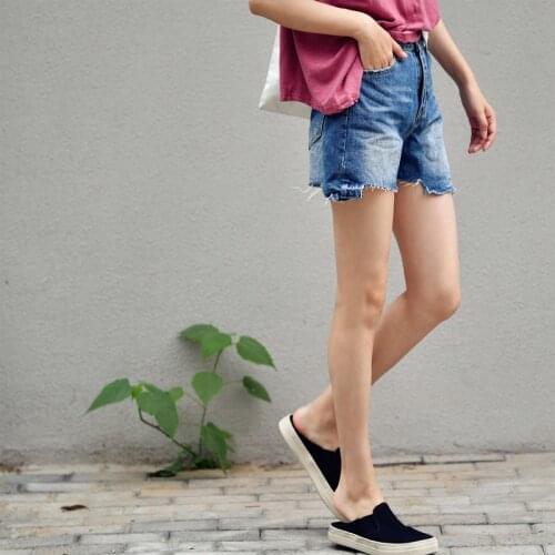 MICOCO N7019 Retro nostalgia blue irregular torn edge grinding white grab jean shorts women loose