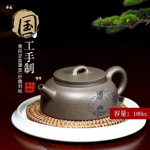 True art engraving pure manual teapot yixing are recommended by kung fu tea green cover period of mud fish pot