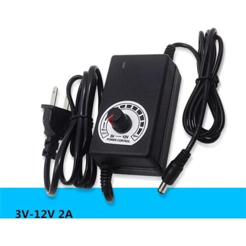 50 PCS/LOT Universal power adapter Adjustable AC 100V-240V to DC 3V-12V Multiple protection features Regulated supply adatpor 2A