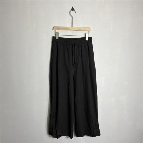 Summer mens simple pure black light casual nine point pants tether elastic waist speaker pants feet open leg pants