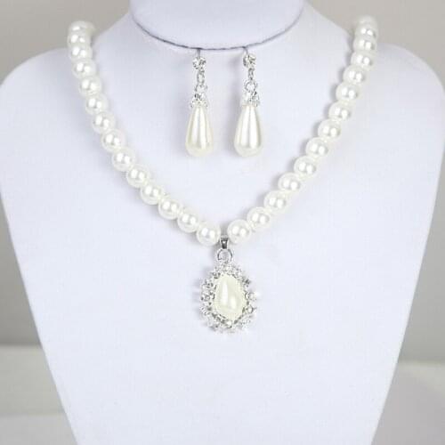 2018 New Imitation Pearls Pendant Necklace Suit Charm Female Long Necklace Statement Party Earrings Nigerian Wedding Jewelry Set