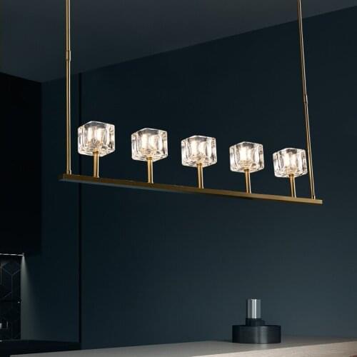 Postmodern light luxury chandelier Nordic copper straight row dining room bar living room simple crystal lamp