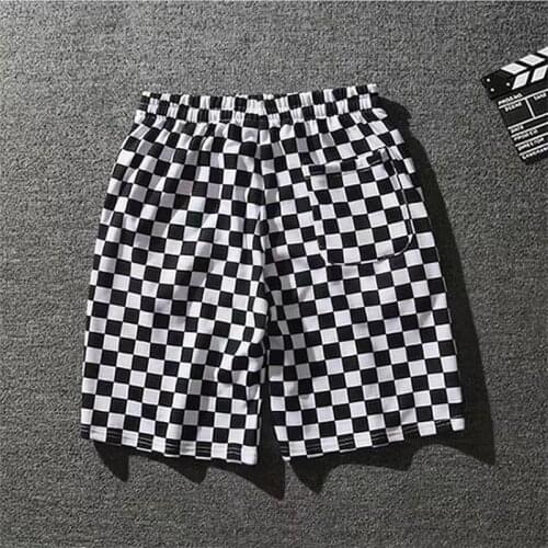 Mens summer fashion week street shot the same checkerboard personality shorts black and white checked shorts