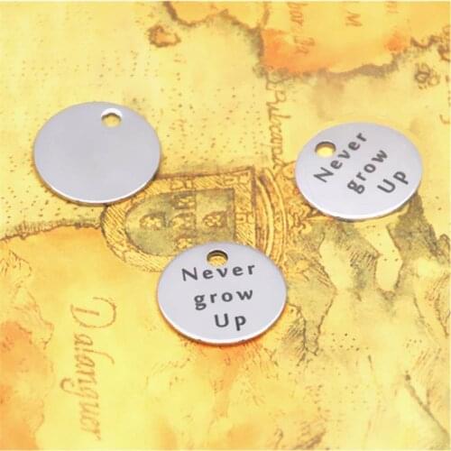 10pcs/lot Never Grow Up charm silver tone message charm pendant 20mm
