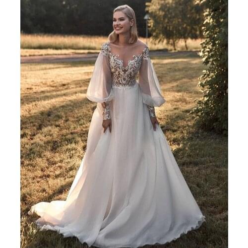 Boho Wedding Dress 2021 A-Line Puff Long Sleeve Chapel Train Transparent Back Bridal Gowns Lace Appliques Graceful White Ivory