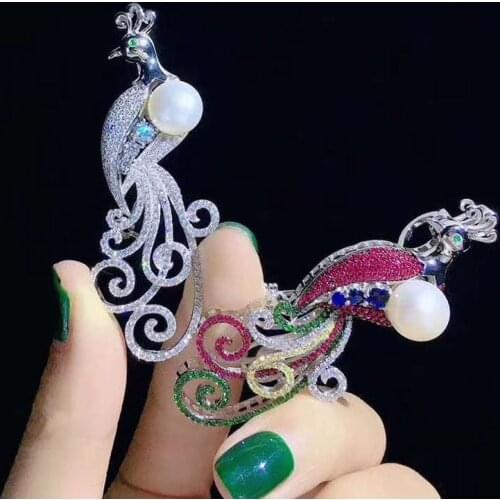 White sea shell pearl Cubic Zirconia micro pave peacock brooch