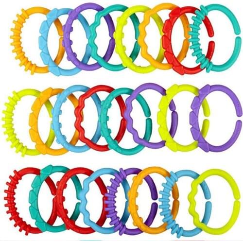 8Pcs/set Plastic Grip Baby Teether Rattles Rubber Rainbow Ring Molars Rattle Safety Toys for Children Crib Bed Stroller Hanging