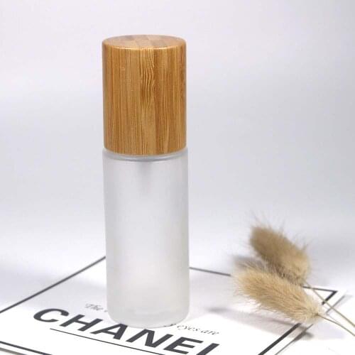 Empty 50ml glass frosted Bottle Lotion Pump spray pump with Bamboo cap