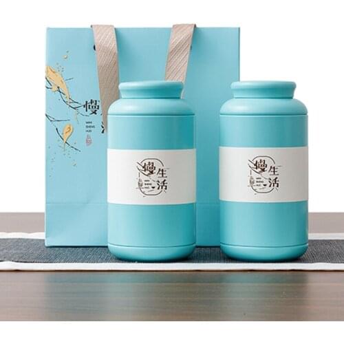 Xin Jia Yi Packaging Round Small Big Size Metal Tea Kitchen Tin Box Paper Bags With Handles Empty Metal Wholesale Gift Tin Box