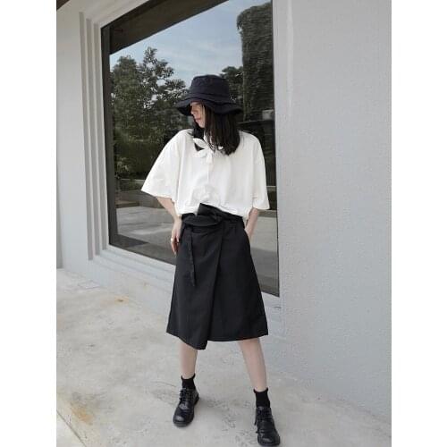 Home-made original yamamoto-style asymmetrical black shorts, androgynous undershorts, split-length