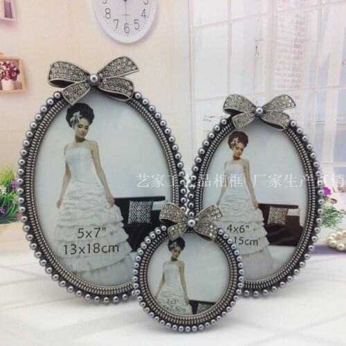 Picture Frames studio fashion desktop photo frames swing sets diamond fresh metal alloy with handmade pearl photo frame