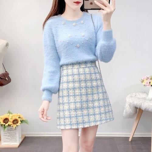 2021 Autumn And Winter New Womens Two-piece Fashion Short Skirt Suit Beaded Long-sleeved Sweater + Plaid Wool Skirt