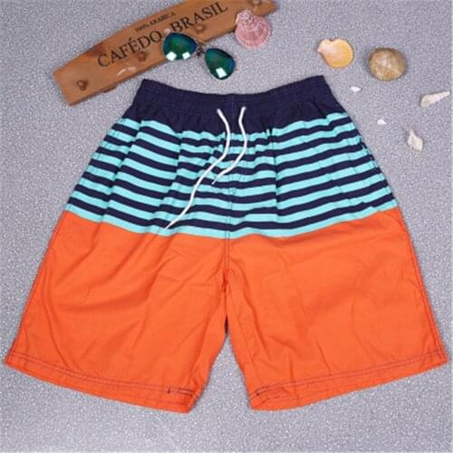 European mens casual sports shorts, beach pants, mens speed-fuck, plus-five Pants, plus-five underpants J005