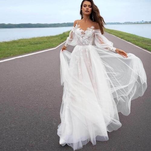 Elegant Sweep Train A-Line Wedding Dresses Tulle Lace Appliques Sweetheart Full Sleeve Zipper Back Bridal Gowns 2021 Custom Made
