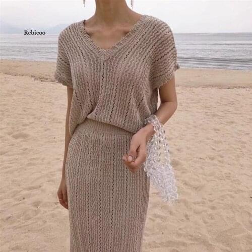 Summer New Womens Knit Suits Simple Elegant Hollow Short Sleeved Tops And Knitting Long Skirt Woman Casual Two Piece Set