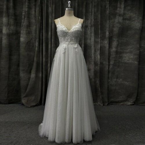2020 New Bling Bling Glitter Tulle Wedding Dress Spaghetti Straps Backless Sequined Flowers Embellished Bridal Gowns
