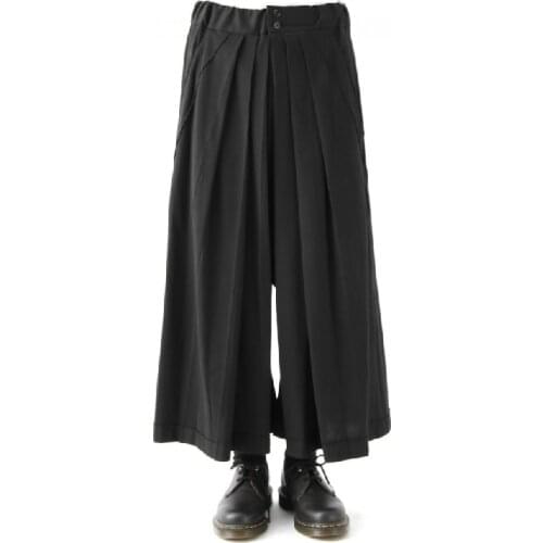 Mens wear shows Fashionable mens wide-leg trousers with loose personality design and ruffled skirt trousers