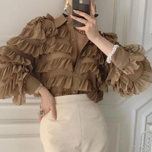 New Spring And Autumn Retro Fashion Lapel Single-breasted Ruffled Tops Womens Long-sleeved Tops Loose Splicing Cake Shirts