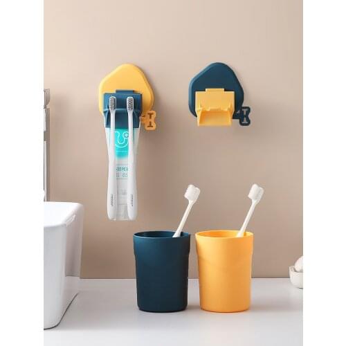 Wall mounted toothbrush holder hole free mouthwash cup storage rack toothpaste squeezer toothbrush cup set storage rack
