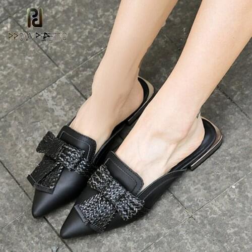 New summer cowhide casual flat woven bowknot Muller shoes shallow mouth metal heel black fashion half slippers