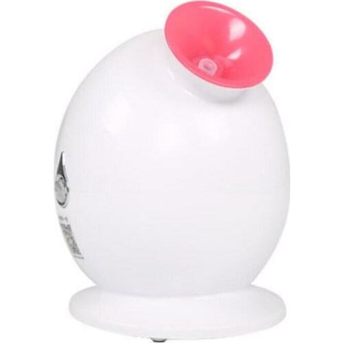 High quality household in 2017 steam face evaporator is used to steam the face machine water dispenser is added to the moisturiz