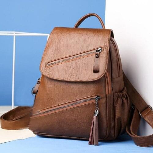Brand Women Men Tassel Backpack Leather School Backpack Bag Fashion Waterproof Travel Bag Casual Leather Book Bag Male