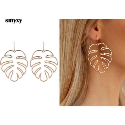 New POP Women Metal Rose Gold/Silver color Hollow Leaves Earrings Personality Exaggerated Ladies Party Novelty Jewelry