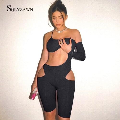 Sexy Hollow Out Black Solid Playsuit One-shoulder Asymmetric Sleeve Beach Style Rompers Slash Neck Skinny Streetwear Bodysuit