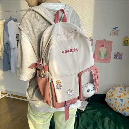 Fashion Womens Backpack Kawaii Doll Pendant Schoolbag For Girls Nylon Waterproof Travel Backpack With Many Pockets 2021