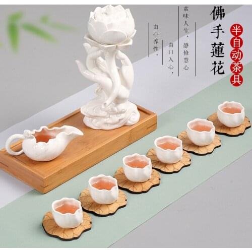 Ten pieces. Bergamot lotus. Semi-automatic tea set. Creative Kungfu Ceramic Purple Sand Lazy Tea Maker Set
